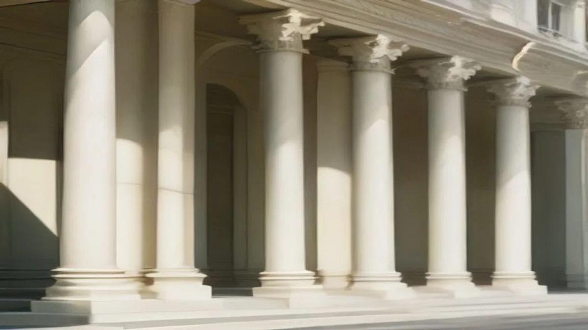 soft civic building facade with columns in pale light